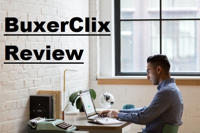 Buxerclix review. Man sitting in front of a laptop